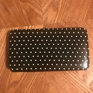 Black and white polka dot slim wallet.